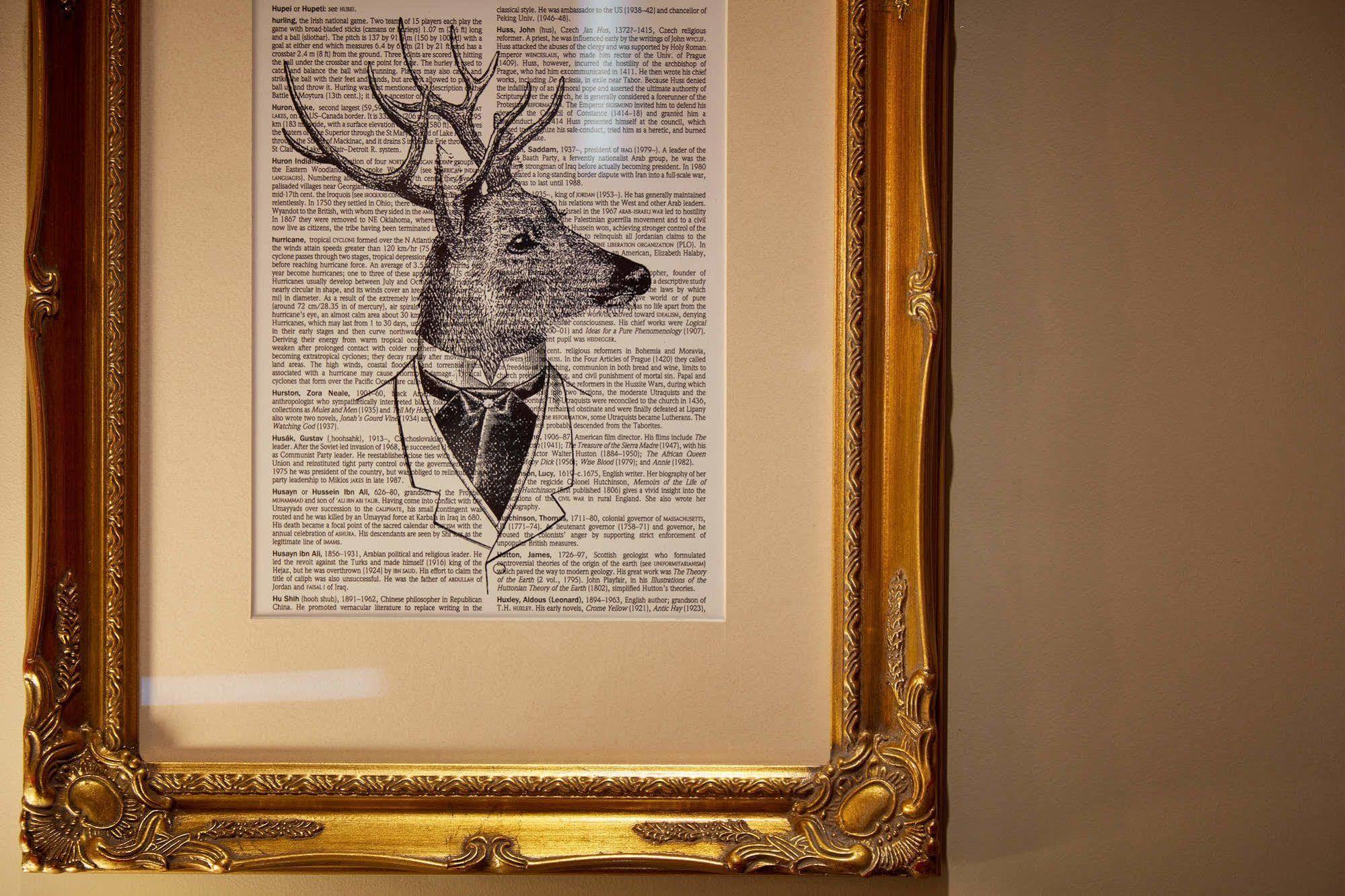 Oddfellows On The Park Чідл Екстер'єр фото A framed print of a deer head with a bow tie